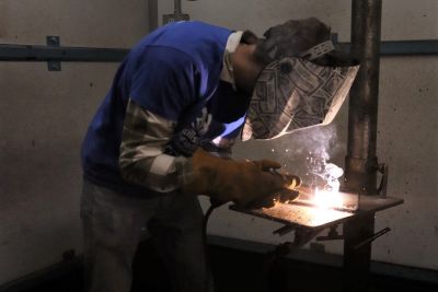A student welding at 
